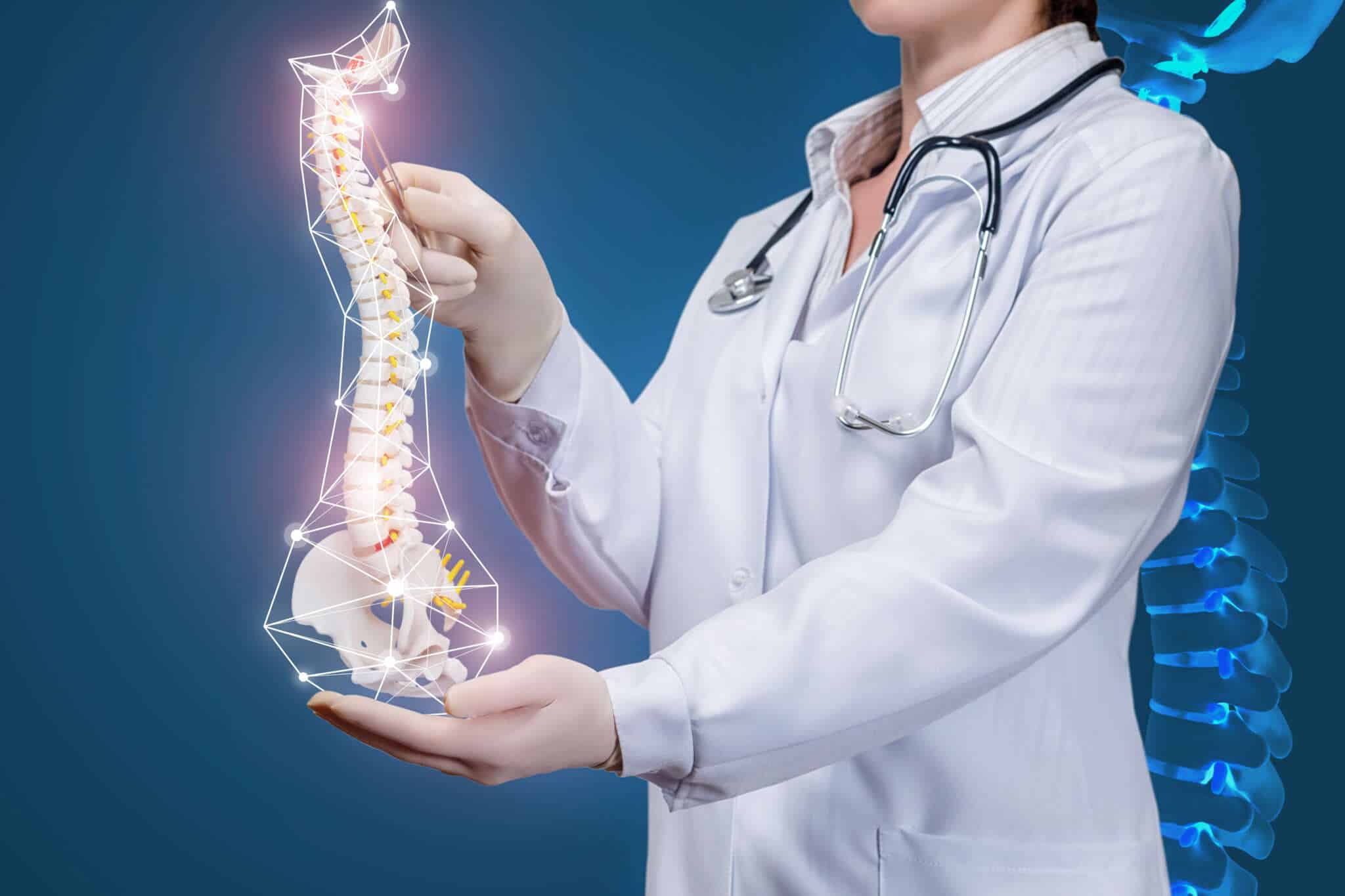 Doctor with spine model